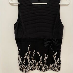 Beautiful black and white BeBe top
